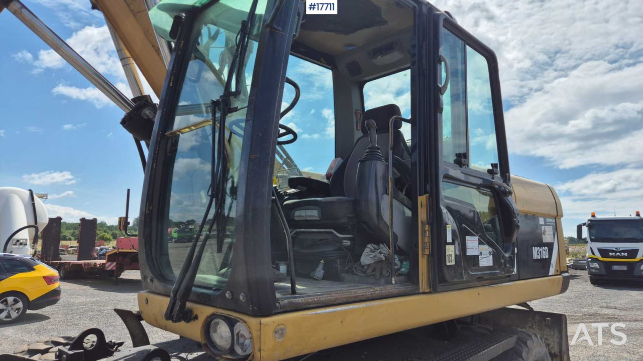 Багер на тркала 2008 CAT M316D: слика 19 Багер на тркала 2008 CAT M316D: слика 19