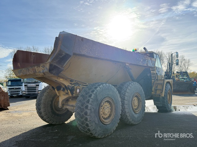 2012 Cat 725 Kiepwagen met knikbesturing - Зглобен истоварувач: слика 4 2012 Cat 725 Kiepwagen met knikbesturing - Зглобен истоварувач: слика 4