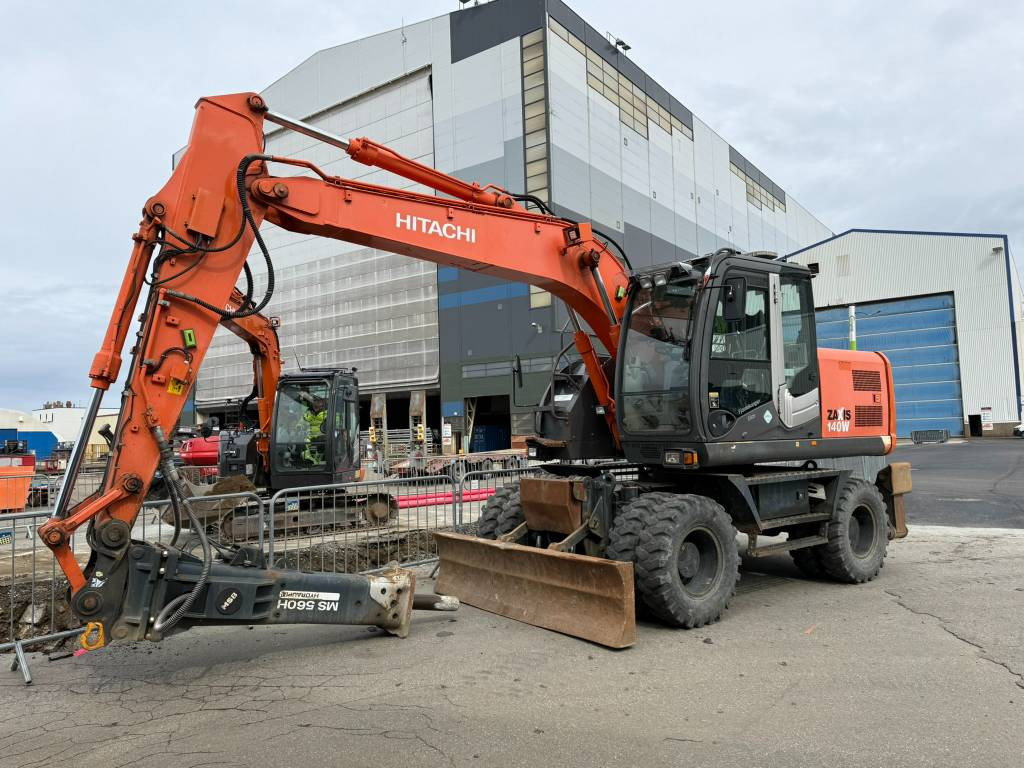 Hitachi ZX 140 W-3 - Багер на тркала: слика 1 Hitachi ZX 140 W-3 - Багер на тркала: слика 1