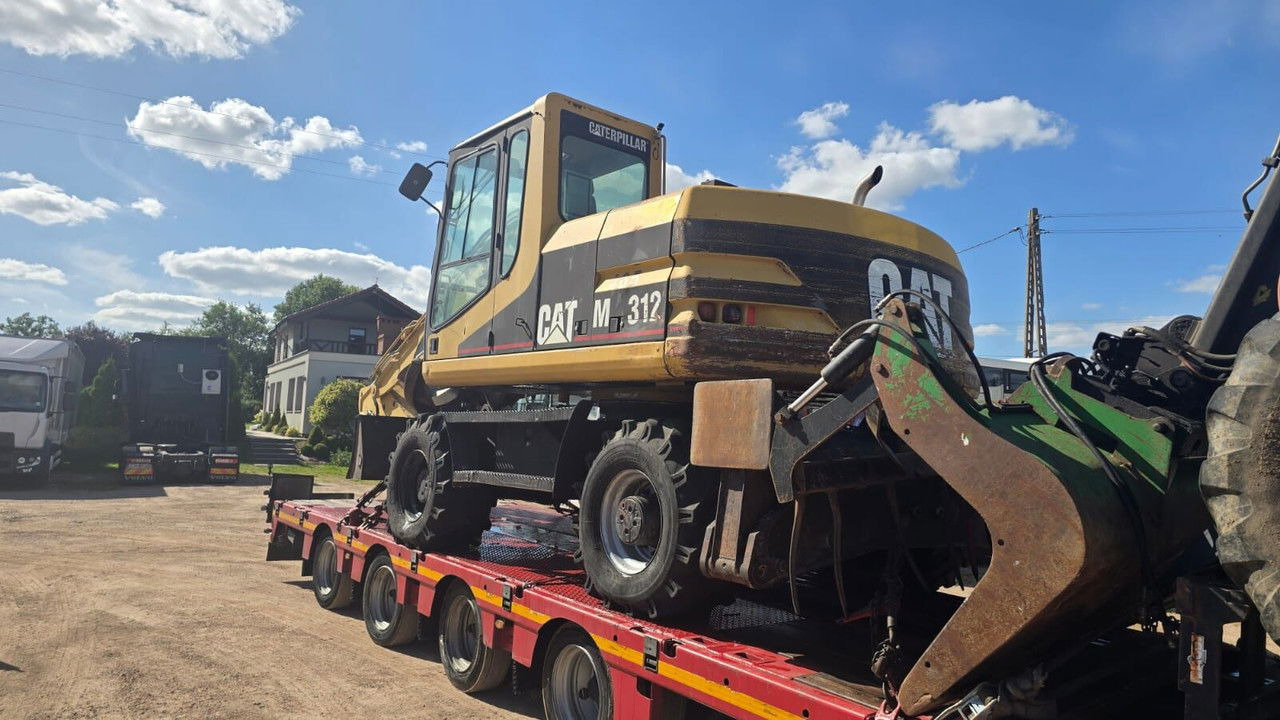 Caterpillar M312 Koparka PrzeŁAdunkowa Czerpak Świeżo Sprowadz ona - Багер на тркала: слика 4 Caterpillar M312 Koparka PrzeŁAdunkowa Czerpak Świeżo Sprowadz ona - Багер на тркала: слика 4
