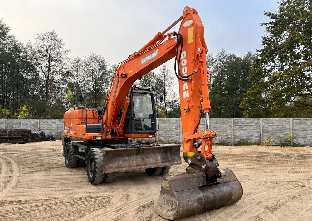 Doosan DX140W-3 - Багер на тркала: слика 2 Doosan DX140W-3 - Багер на тркала: слика 2