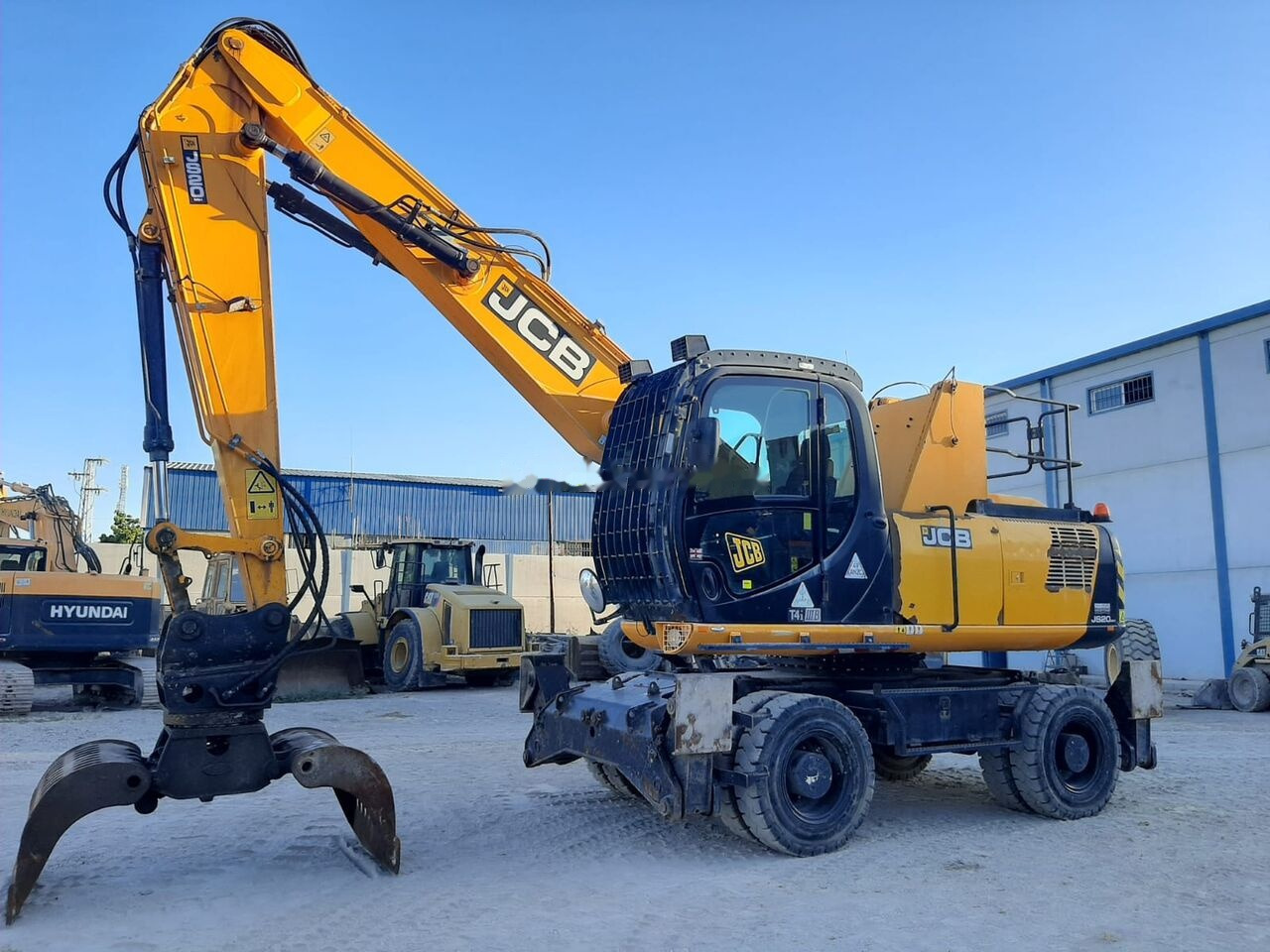 JCB JS 200 - Багер на тркала: слика 1 JCB JS 200 - Багер на тркала: слика 1