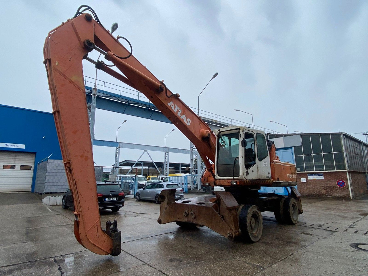 Atlas 1704 MI mit Greifer Umschlagbagger Lang - Багер на тркала: слика 4 Atlas 1704 MI mit Greifer Umschlagbagger Lang - Багер на тркала: слика 4