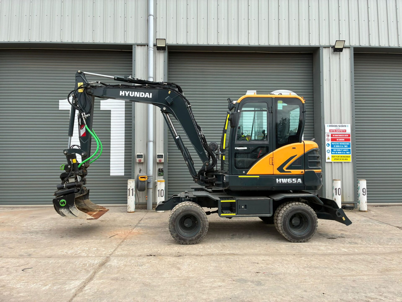 Hyundai HW65AH Ex Demo - Багер на тркала: слика 2 Hyundai HW65AH Ex Demo - Багер на тркала: слика 2