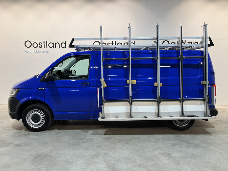 Volkswagen Transporter 2.0 TDI L2H1 / Van Den Born Glasresteel / Euro 6 / Airco / Glastransporter / Cruise Control / Trekhaak / Imperiaal / CarPlay / Navigatie / PDC / 83.500 KM !! - Комбе: слика 2 Volkswagen Transporter 2.0 TDI L2H1 / Van Den Born Glasresteel / Euro 6 / Airco / Glastransporter / Cruise Control / Trekhaak / Imperiaal / CarPlay / Navigatie / PDC / 83.500 KM !! - Комбе: слика 2