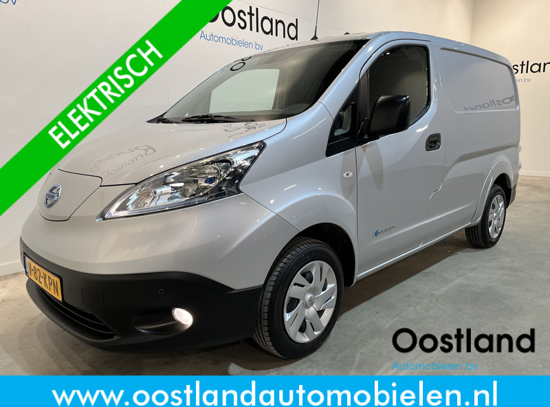 Nissan E-NV200 Business 40 kWh / 100% elektrisch !! / Airco / Cruise Control / Camera / Navigatie / 9.800 KM !! / BPM VRIJ !! - Мало комбе, Електрично комбе: слика 1 Nissan E-NV200 Business 40 kWh / 100% elektrisch !! / Airco / Cruise Control / Camera / Navigatie / 9.800 KM !! / BPM VRIJ !! - Мало комбе, Електрично комбе: слика 1