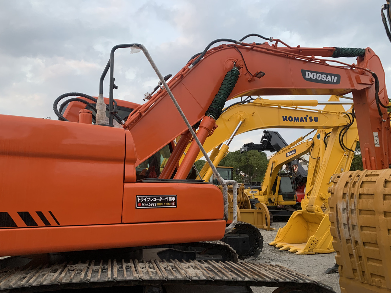 DOOSAN DX225LC - Багер на тркала: слика 1 DOOSAN DX225LC - Багер на тркала: слика 1