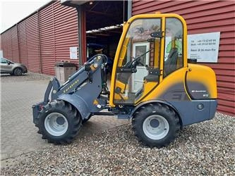 Eurotrac W12S med førerhus, skovl og gafler - Земјоделски натоварувач: слика 1 Eurotrac W12S med førerhus, skovl og gafler - Земјоделски натоварувач: слика 1
