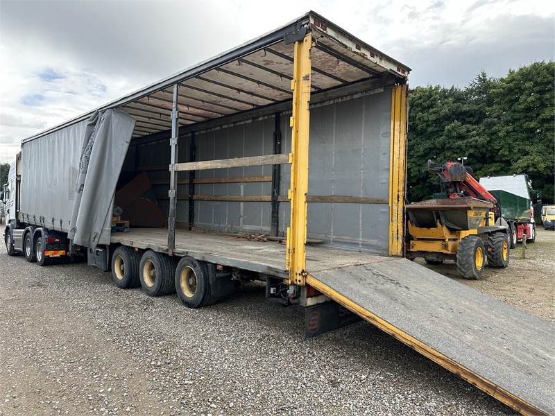 Schmitz Cargobull Machine transport trailer with bag ramp - Полуприколка: слика 3 Schmitz Cargobull Machine transport trailer with bag ramp - Полуприколка: слика 3