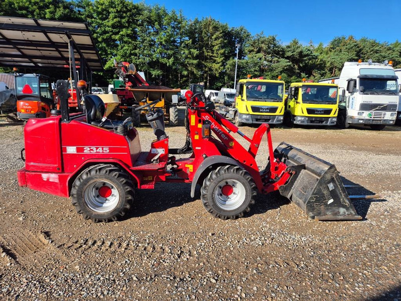 Schäffer 2345 (Bucket/Forks) - Компактен натоварувач со гасеници: слика 5 Schäffer 2345 (Bucket/Forks) - Компактен натоварувач со гасеници: слика 5