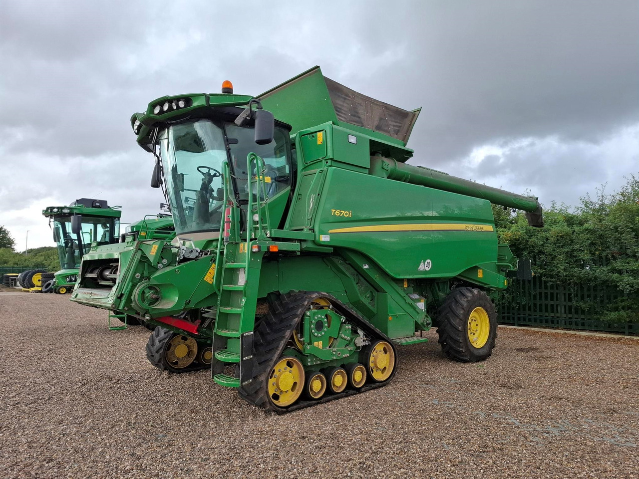 John Deere T670i - Комбајн: слика 1 John Deere T670i - Комбајн: слика 1