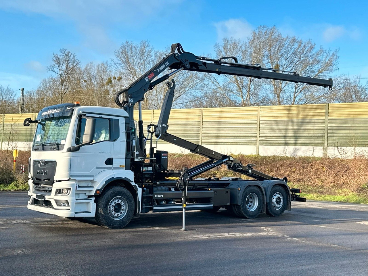 MAN TGS 26.470 6x2 Abrollkipper + Kran Hiab 138-3 - Камион со кука за подигање, Камион со кран: слика 1 MAN TGS 26.470 6x2 Abrollkipper + Kran Hiab 138-3 - Камион со кука за подигање, Камион со кран: слика 1