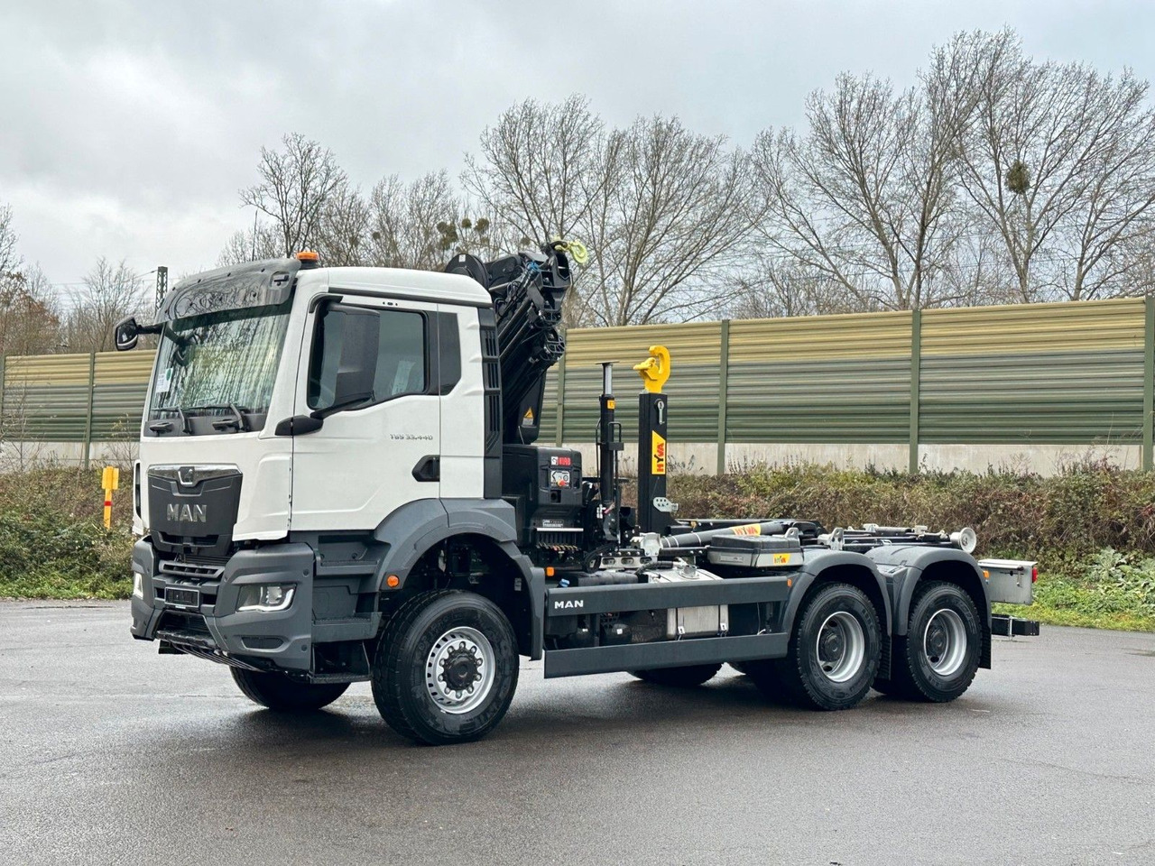 MAN TGS 33.440 6x6 BB Abrollkipper+Kran Hiab 228-6 - Камион со кука за подигање, Камион со кран: слика 3 MAN TGS 33.440 6x6 BB Abrollkipper+Kran Hiab 228-6 - Камион со кука за подигање, Камион со кран: слика 3