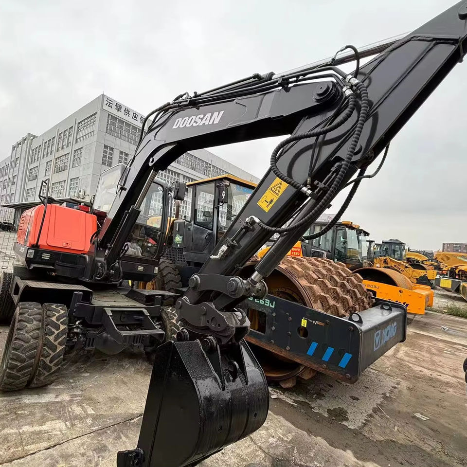 Hot Sale Used Doosan Dx75 Small 7.5t Wheel Excavator South Korea DX75 Mini Excavator for Sale Good Condition - Багер гасеничар: слика 1 Hot Sale Used Doosan Dx75 Small 7.5t Wheel Excavator South Korea DX75 Mini Excavator for Sale Good Condition - Багер гасеничар: слика 1