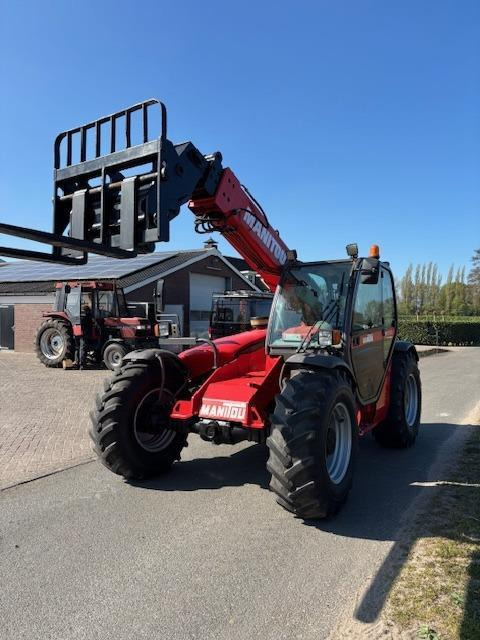 Manitou MT-932 TDL-11-N - Телескопски ракувач: слика 1 Manitou MT-932 TDL-11-N - Телескопски ракувач: слика 1