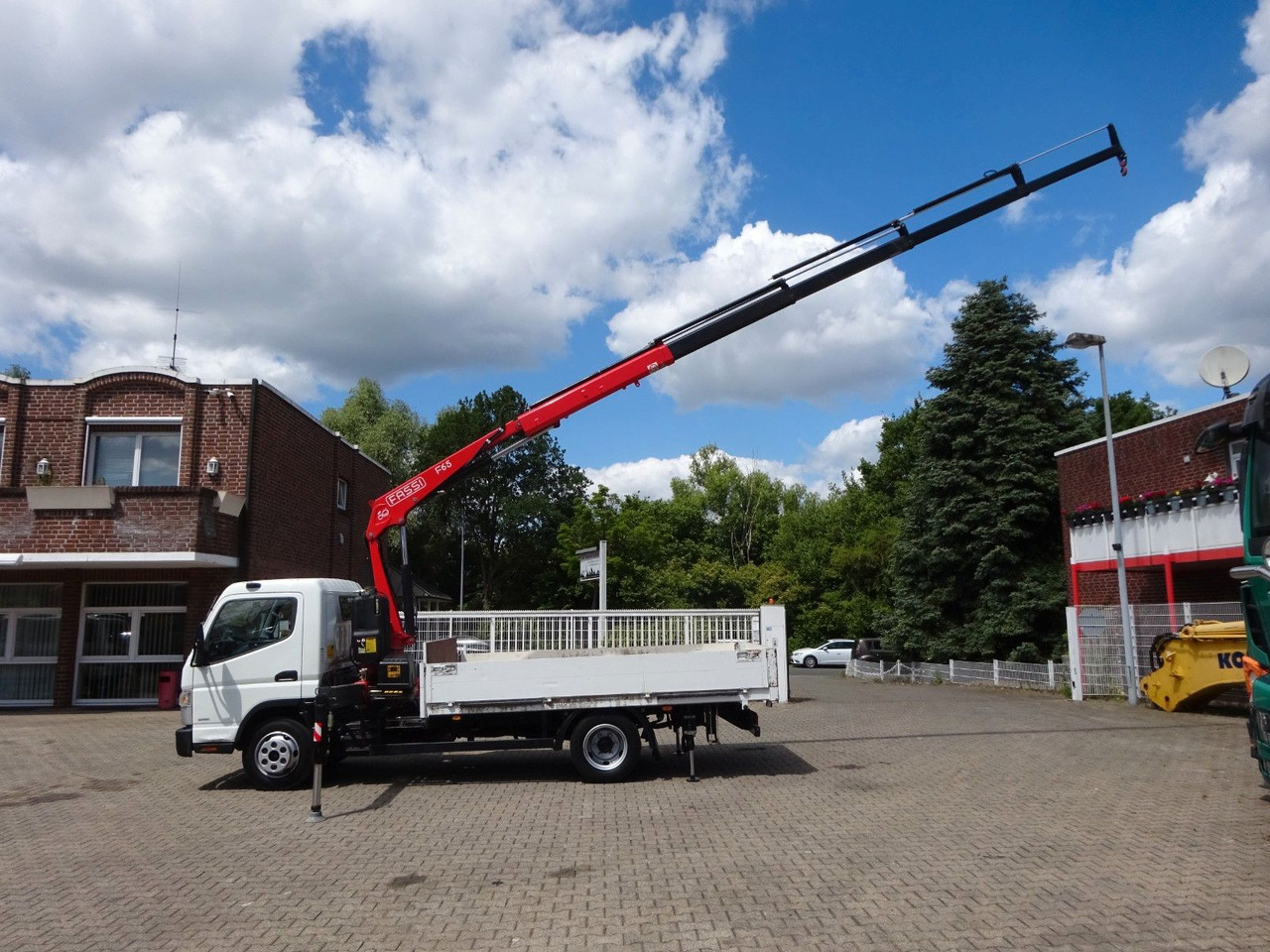 FUSO Canter 7C15 mit FASSI F65A Kran - Камион со кран, Камион со платформа: слика 4 FUSO Canter 7C15 mit FASSI F65A Kran - Камион со кран, Камион со платформа: слика 4