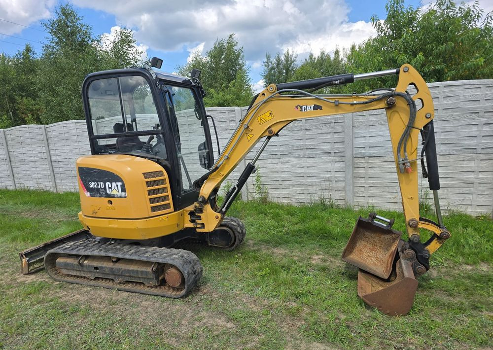 Caterpillar - Мини багер: слика 1 Caterpillar - Мини багер: слика 1