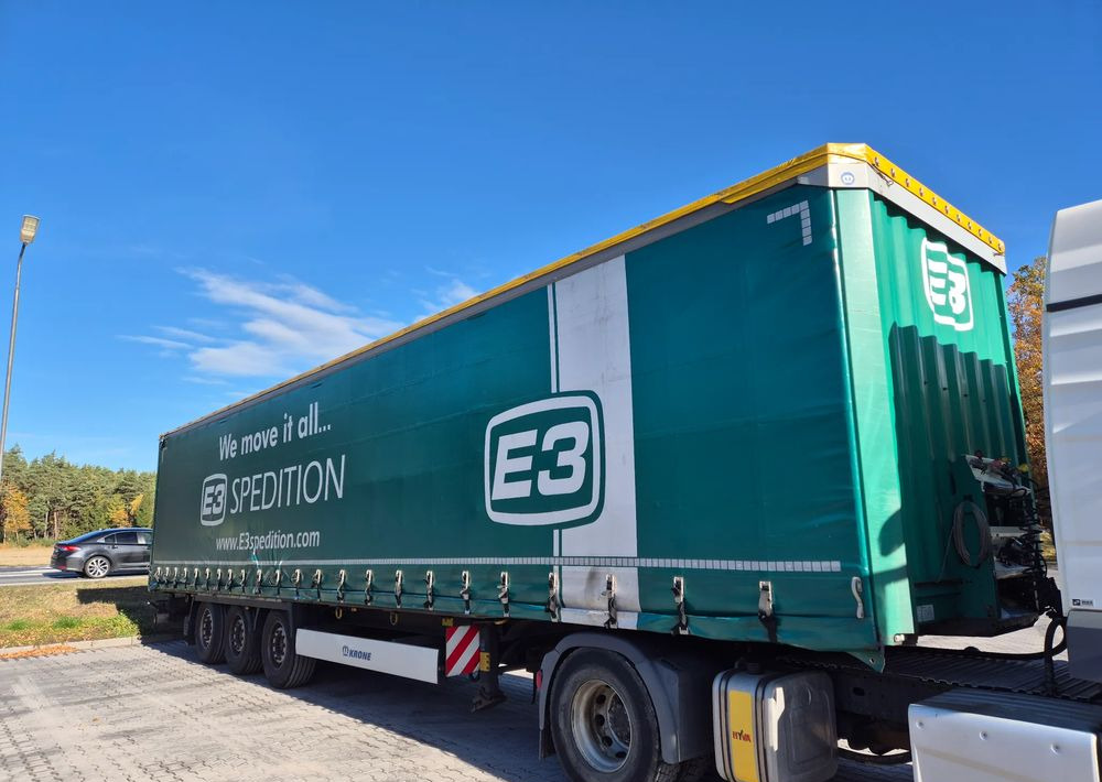 Krone BDE STANDARD PODNOSZONY DACH / z Niemiec PONADGABARYTY POSZERZANA OPONY 80% - Полуприколка со церада: слика 1 Krone BDE STANDARD PODNOSZONY DACH / z Niemiec PONADGABARYTY POSZERZANA OPONY 80% - Полуприколка со церада: слика 1