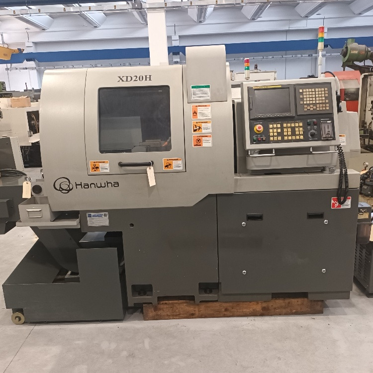 Tornio a fantina mobile a 5 assi Cnc Hanwha XD-20H - Машина за обработка на метал: слика 1 Tornio a fantina mobile a 5 assi Cnc Hanwha XD-20H - Машина за обработка на метал: слика 1
