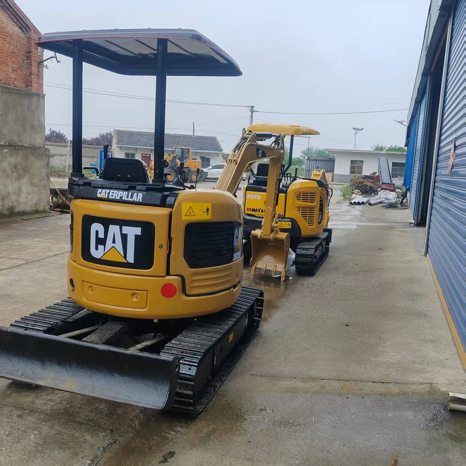 CATERPILLAR 303ECR - Мини багер: слика 3 CATERPILLAR 303ECR - Мини багер: слика 3
