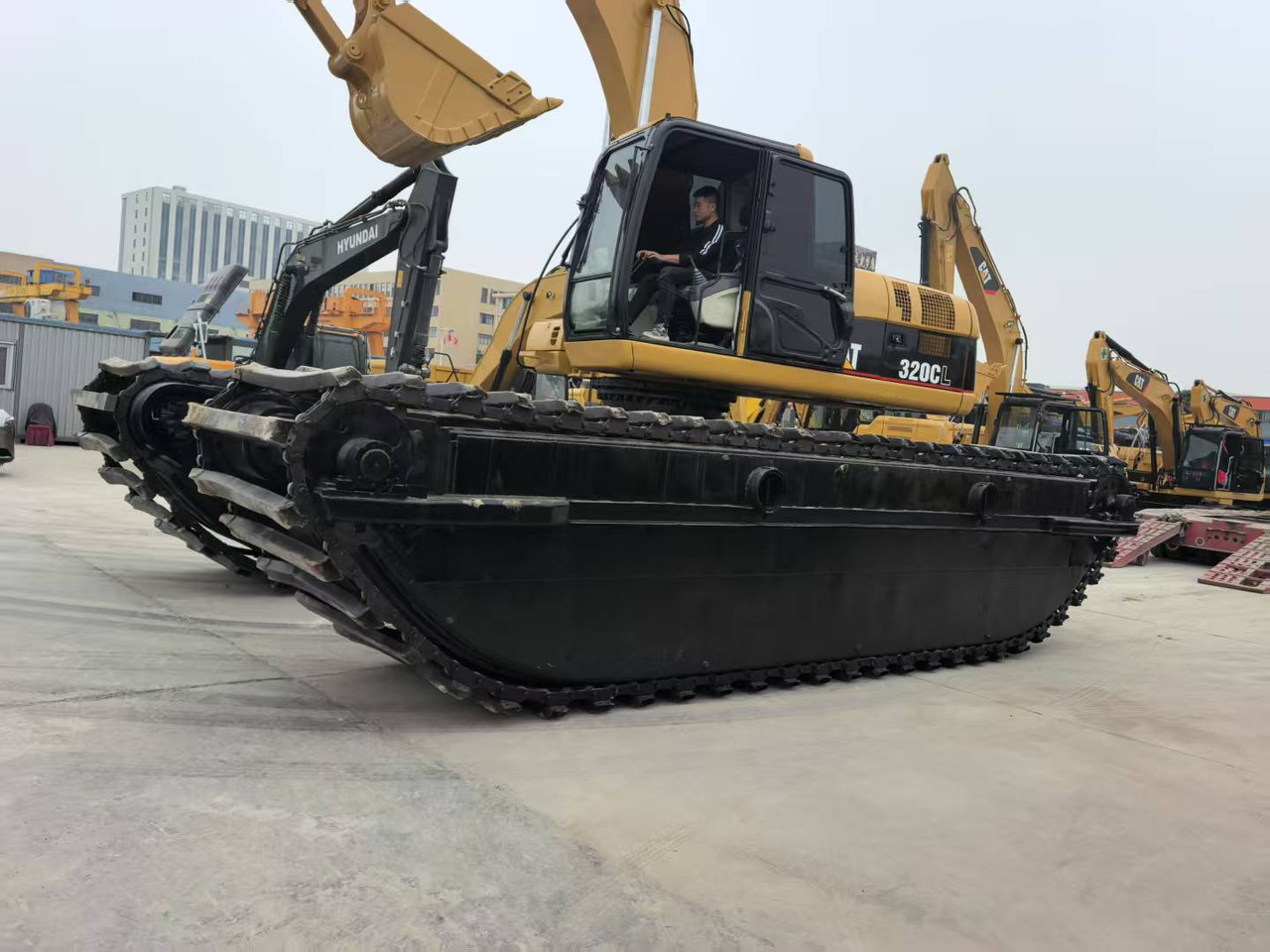 CATERPILLAR 320C boat excavator - Амфибиски багер: слика 2 CATERPILLAR 320C boat excavator - Амфибиски багер: слика 2