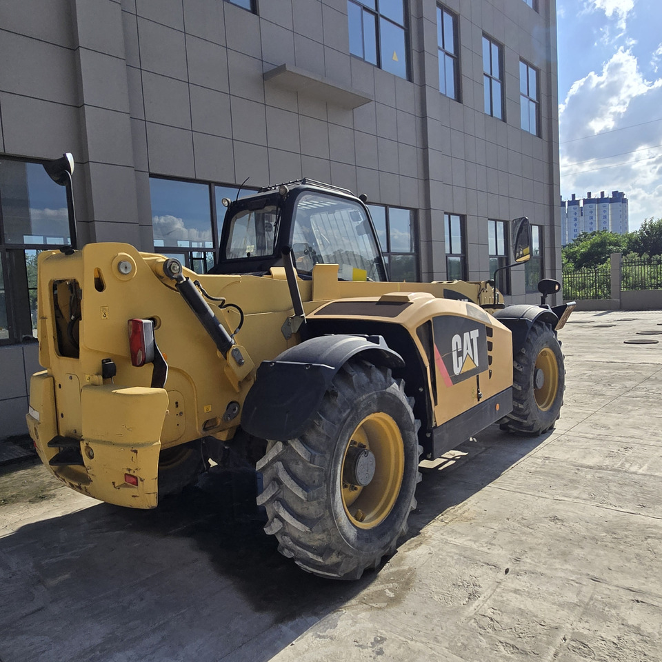 CATERPILLAR TH414 - Телескопска платформа: слика 1 CATERPILLAR TH414 - Телескопска платформа: слика 1