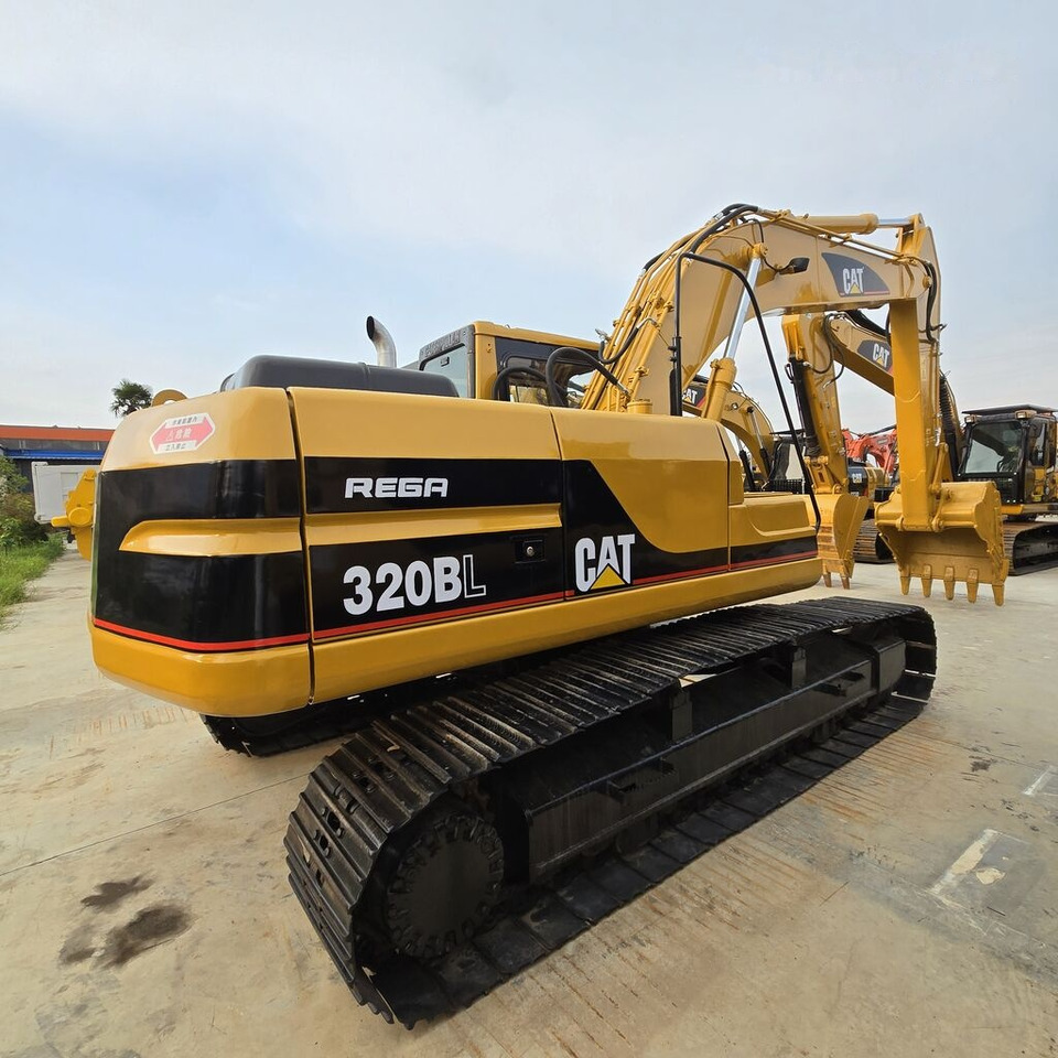 Caterpillar 320BL - Багер гасеничар: слика 1 Caterpillar 320BL - Багер гасеничар: слика 1