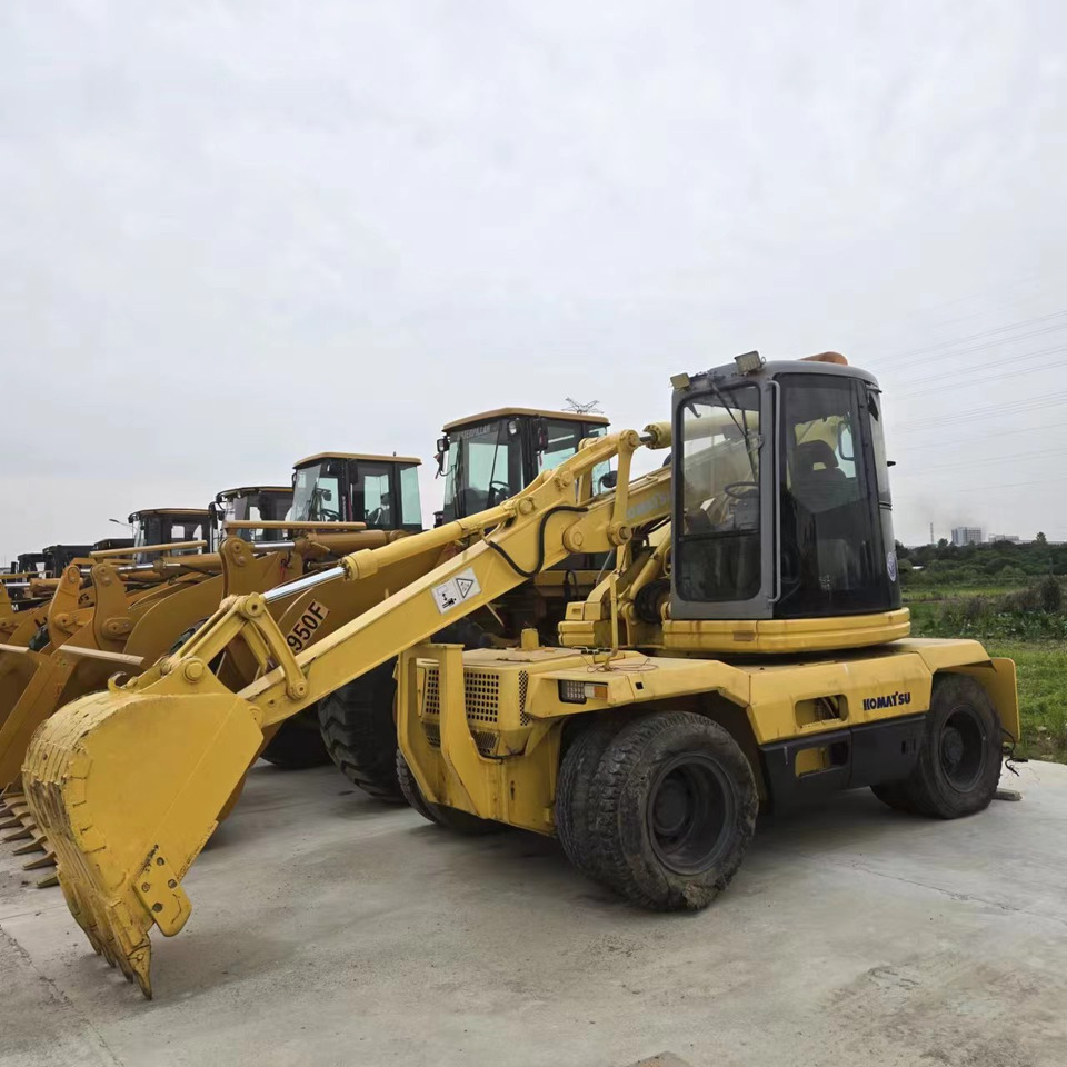 KOMATSU PC128US - Багер на тркала: слика 1 KOMATSU PC128US - Багер на тркала: слика 1