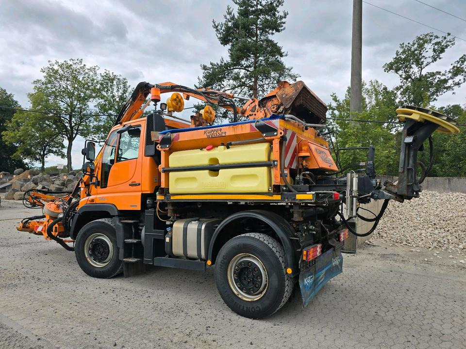 Unimog U400 2013 405/10 405/12 NKS-Z-UGN-43K Bluetec 5 Mercedes-Benz UGE UGN Mulag MKM700 Mähausleger Böschungsmäher Böschungsmulcher Küpper-Weisser IMS Salzstreuer - Машина за чистење снег: слика 3 Unimog U400 2013 405/10 405/12 NKS-Z-UGN-43K Bluetec 5 Mercedes-Benz UGE UGN Mulag MKM700 Mähausleger Böschungsmäher Böschungsmulcher Küpper-Weisser IMS Salzstreuer - Машина за чистење снег: слика 3