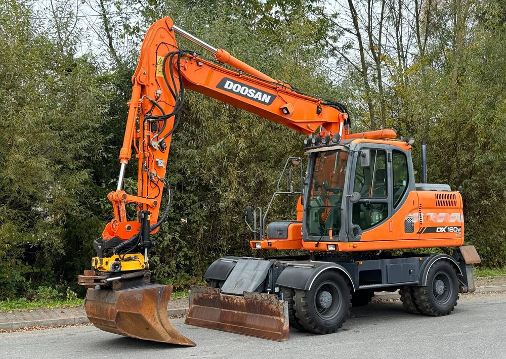 Doosan * DOOSAN DX160W *ROTOTILT* GPS 2D Leica * Sprowadzona * Stan Perfekcyjny * Koparka Kołowa * - Багер на тркала: слика 1 Doosan * DOOSAN DX160W *ROTOTILT* GPS 2D Leica * Sprowadzona * Stan Perfekcyjny * Koparka Kołowa * - Багер на тркала: слика 1