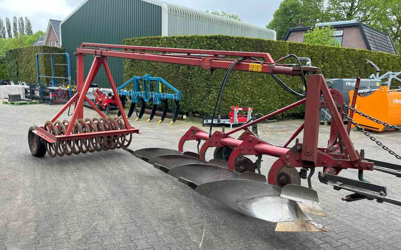 Kverneland 4 schaar ploeg + Evers vorenpakker grondbewerking - Плуг: слика 4 Kverneland 4 schaar ploeg + Evers vorenpakker grondbewerking - Плуг: слика 4