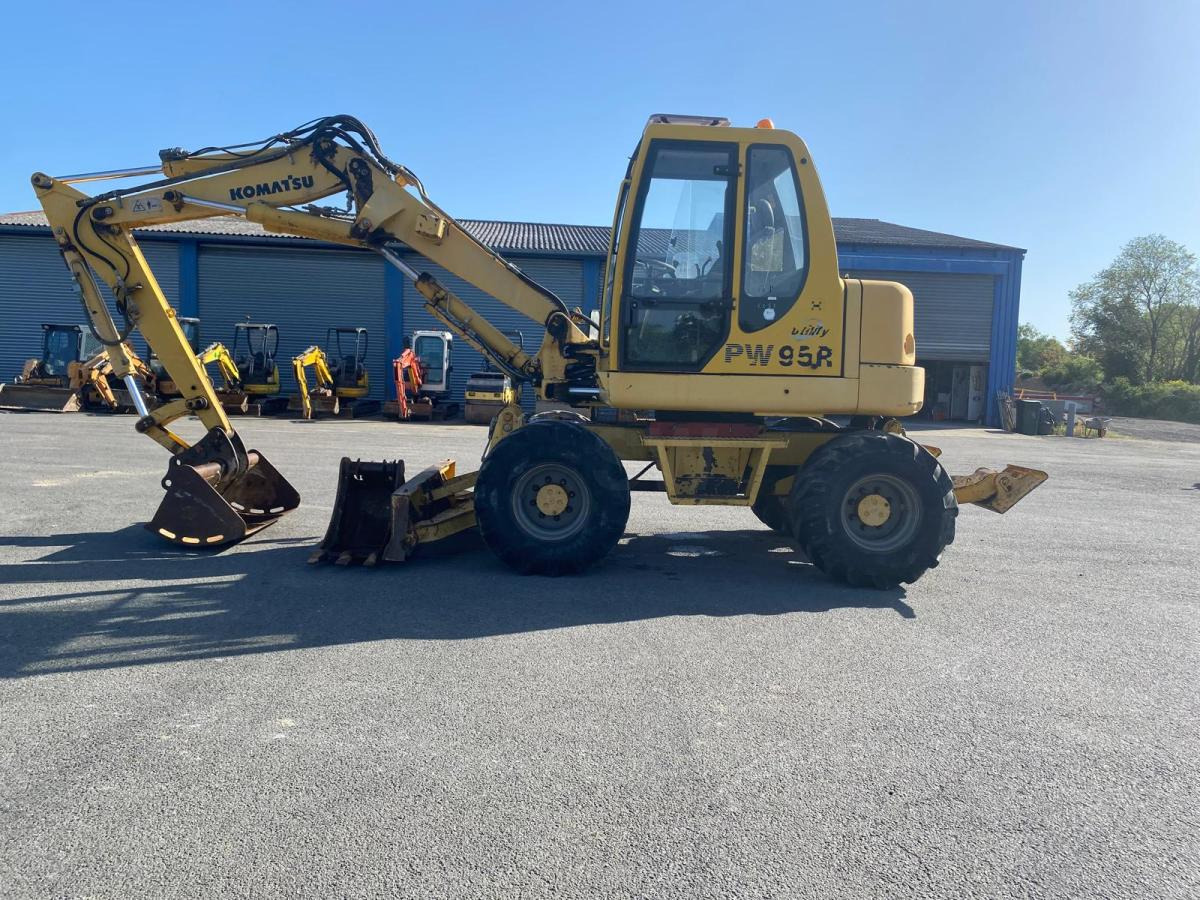 Komatsu PW95 - Багер на тркала: слика 1 Komatsu PW95 - Багер на тркала: слика 1