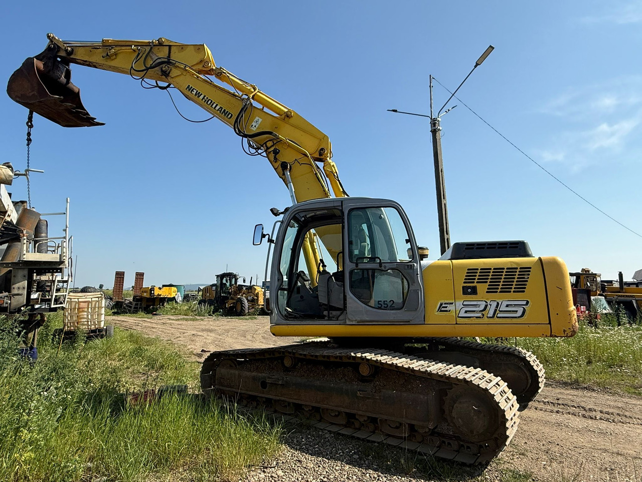 NEW HOLLAND E 215 EXCAVATOR - Багер гасеничар: слика 2 NEW HOLLAND E 215 EXCAVATOR - Багер гасеничар: слика 2
