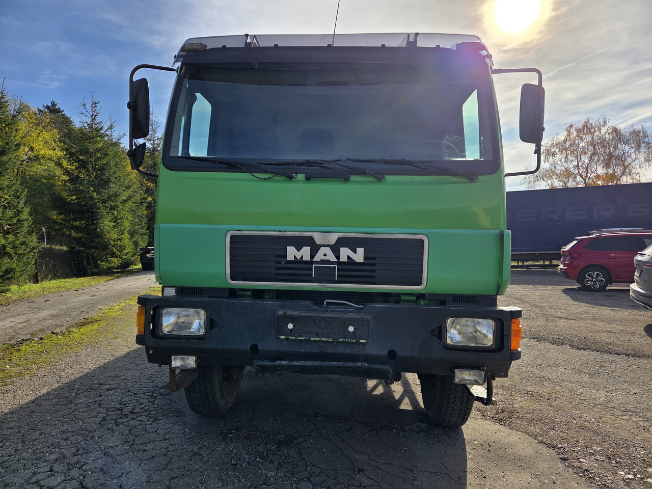 MAN 8.163 4x4 + crane FASSI F45A.22 - Камион со платформа: слика 2 MAN 8.163 4x4 + crane FASSI F45A.22 - Камион со платформа: слика 2