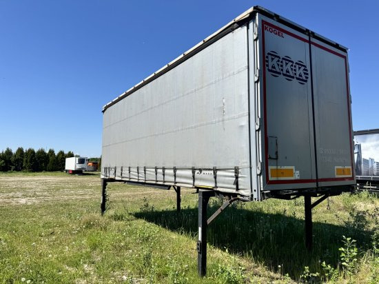 Kögel ENCO 74 - Транспортер на контејнер/ Приколка со променливо тело: слика 1 Kögel ENCO 74 - Транспортер на контејнер/ Приколка со променливо тело: слика 1