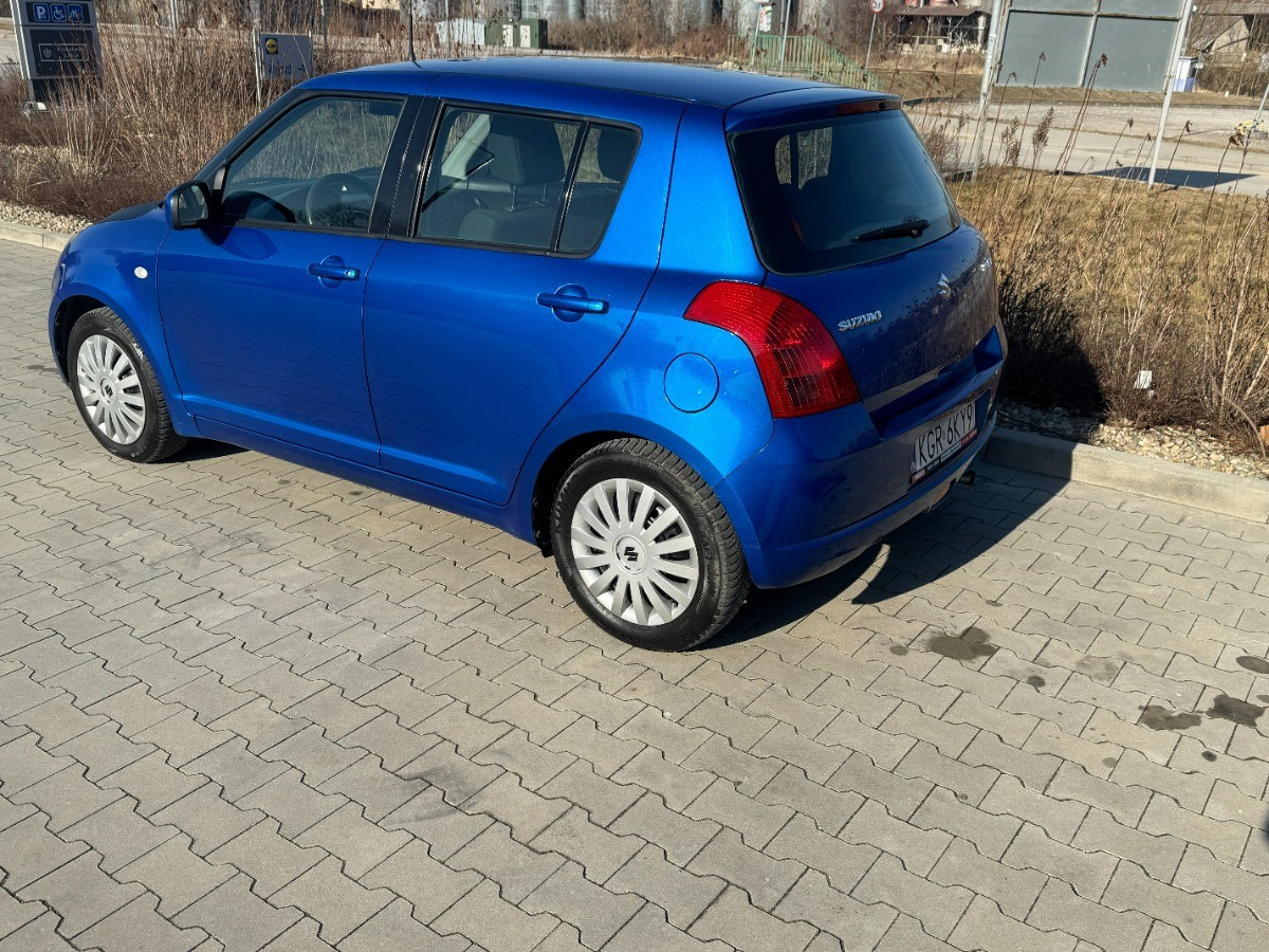 Suzuki Swift 1.3 benzyna 90km Klimatyzacja 136tys przebieg Auto prywatne zadbane - Автомобил: слика 4 Suzuki Swift 1.3 benzyna 90km Klimatyzacja 136tys przebieg Auto prywatne zadbane - Автомобил: слика 4