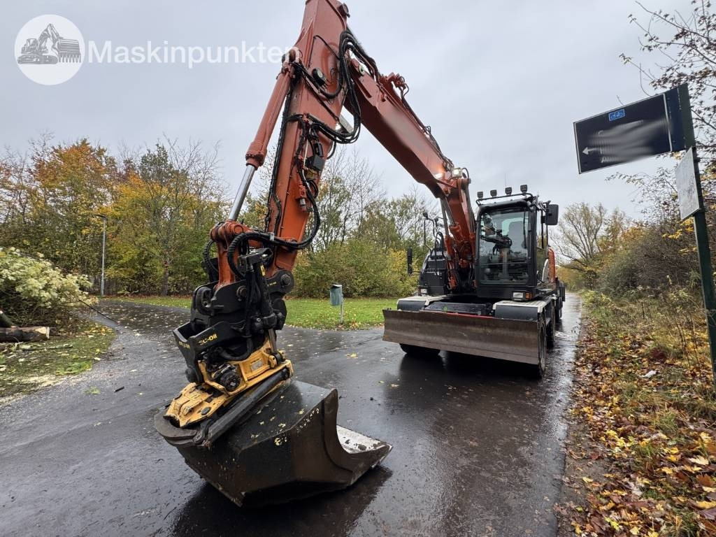 Hitachi ZX 140 W-6 Tippvagn med redskap - Багер на тркала: слика 1 Hitachi ZX 140 W-6 Tippvagn med redskap - Багер на тркала: слика 1