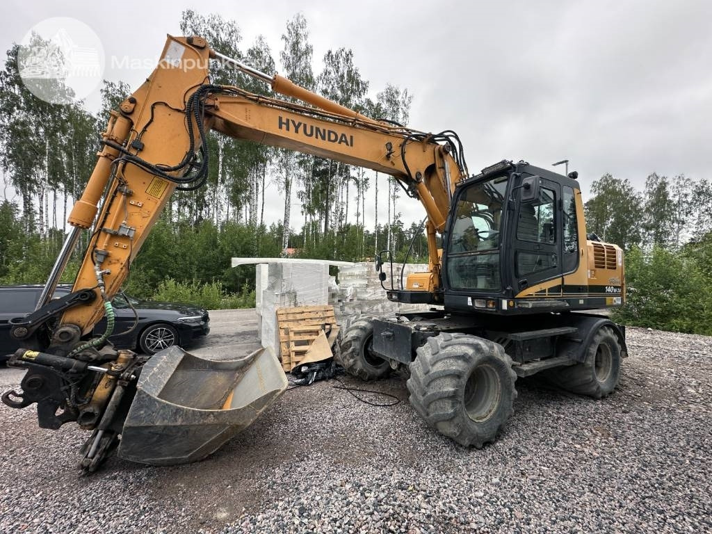 Hyundai Robex 140 W-7 A - Багер на тркала: слика 1 Hyundai Robex 140 W-7 A - Багер на тркала: слика 1