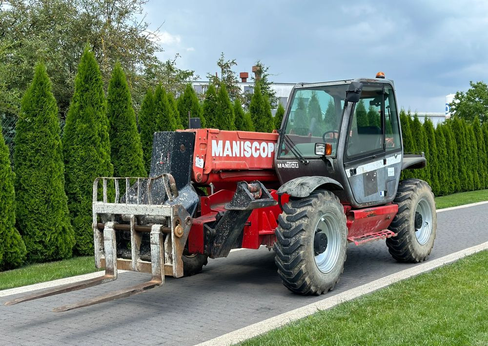 Manitou MT 1233S 12 M - Телескопски ракувач: слика 1 Manitou MT 1233S 12 M - Телескопски ракувач: слика 1