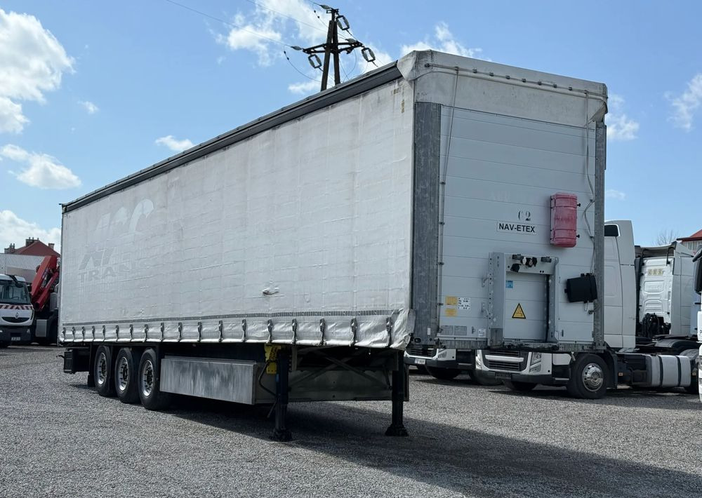 Schmitz Cargobull OSIE SCHMITZ PODNOSZONE OSIE - Полуприколка со церада: слика 1 Schmitz Cargobull OSIE SCHMITZ PODNOSZONE OSIE - Полуприколка со церада: слика 1