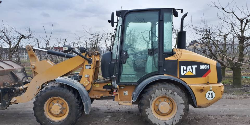 Ładowarka Caterpillar 906H widły + łyżka - Натоварувач на тркала: слика 1 Ładowarka Caterpillar 906H widły + łyżka - Натоварувач на тркала: слика 1