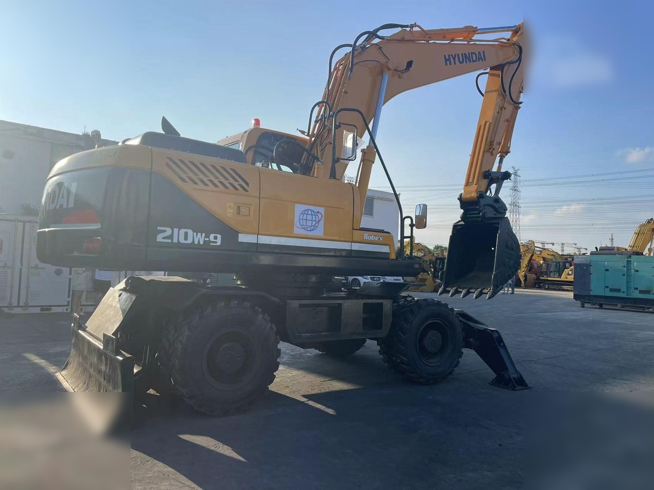 HYUNDAI ROBEX 210W-9 - Багер на тркала: слика 2 HYUNDAI ROBEX 210W-9 - Багер на тркала: слика 2