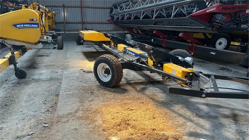 New Holland 4 hjulet skærebordsvogn - Приколка за заглавје на комбајн: слика 1 New Holland 4 hjulet skærebordsvogn - Приколка за заглавје на комбајн: слика 1