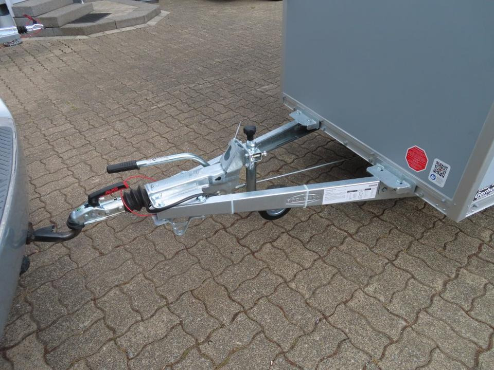 Böckmann PKW-Anhänger Koffer KT2513/135 F Tür-Rampekombination - Приколка сандучар: слика 4 Böckmann PKW-Anhänger Koffer KT2513/135 F Tür-Rampekombination - Приколка сандучар: слика 4