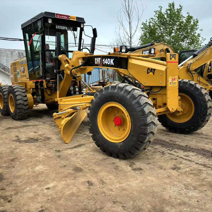 Used Cat 140K New Model Grader Popular Brand Japan Cat Hydraulic Machinery Construction Equipment - Порамнувач: слика 1 Used Cat 140K New Model Grader Popular Brand Japan Cat Hydraulic Machinery Construction Equipment - Порамнувач: слика 1
