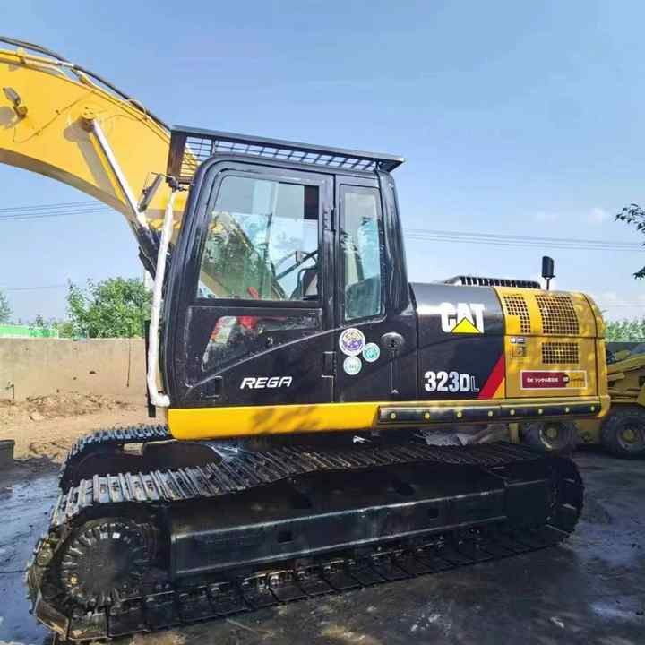 Used Digger CAT 323DL Construction Machinery Construction Digger Used CAT 323DL Cheap Excavator - Багер гасеничар: слика 1 Used Digger CAT 323DL Construction Machinery Construction Digger Used CAT 323DL Cheap Excavator - Багер гасеничар: слика 1