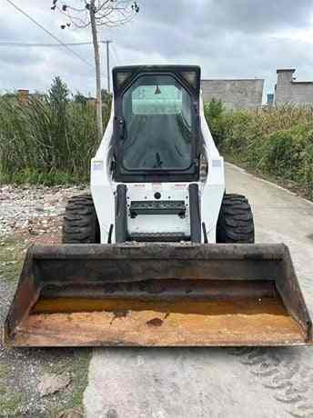 USED BOBCAT S300 Skid-steer Loader with Very Good Performance Is for Sale at a Low Price. S160/s185/s220/330 in Stock - Компактен натоварувач: слика 5 USED BOBCAT S300 Skid-steer Loader with Very Good Performance Is for Sale at a Low Price. S160/s185/s220/330 in Stock - Компактен натоварувач: слика 5