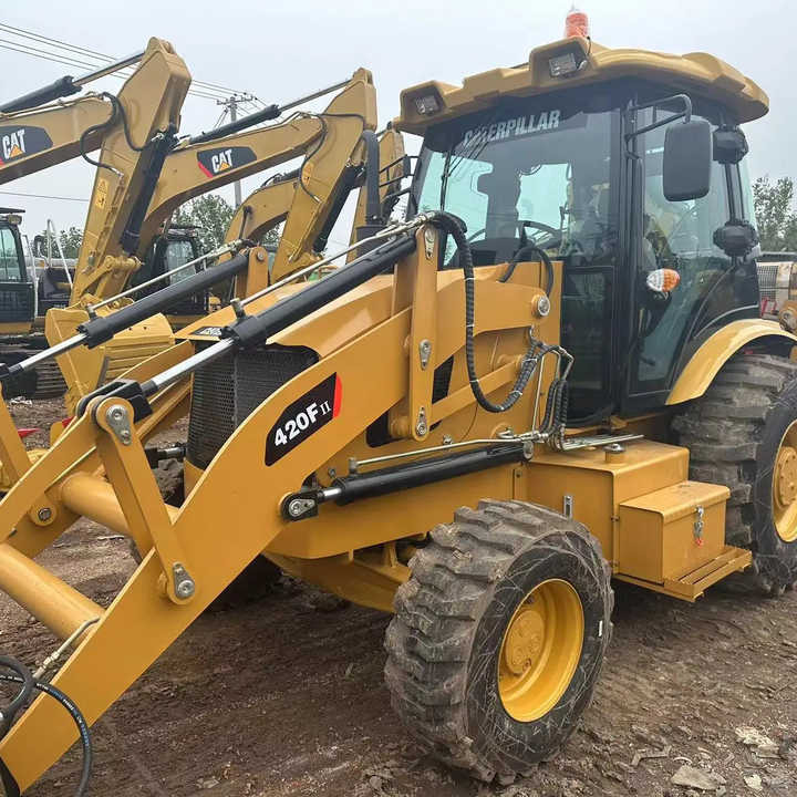 Used Wheel Loader CAT420F Caterpillar 420F Mini Construction Machinery Mini Wheel Skid Steer Loader in Stock - Ровокопач: слика 1 Used Wheel Loader CAT420F Caterpillar 420F Mini Construction Machinery Mini Wheel Skid Steer Loader in Stock - Ровокопач: слика 1