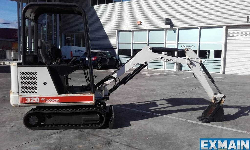 Bobcat X 320 - Мини багер: слика 1 Bobcat X 320 - Мини багер: слика 1