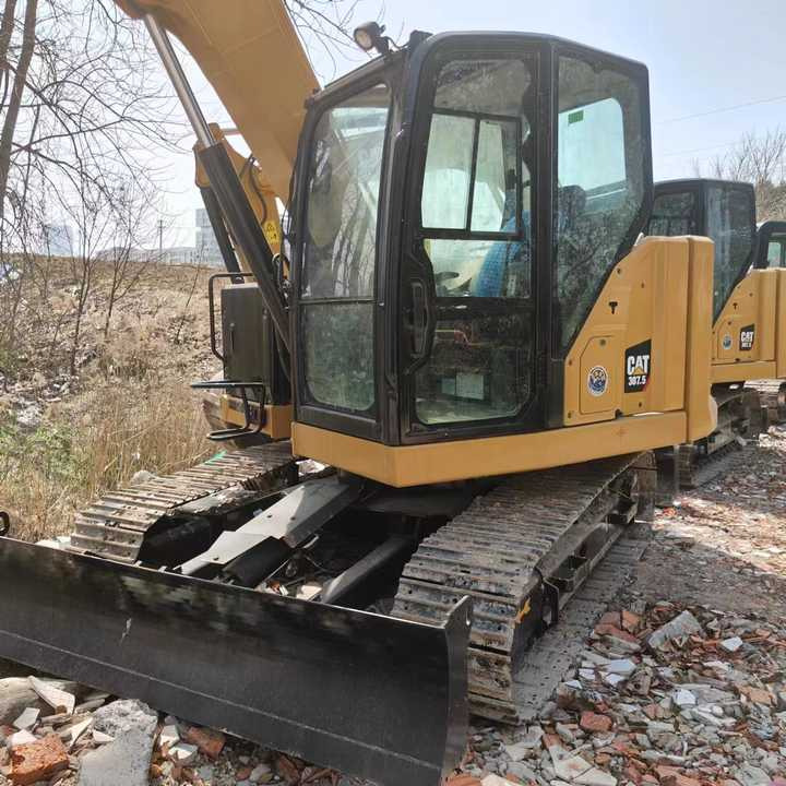 Used Digger CAT 307.5 Construction Machinery Construction Digger Used CAT 307.5 Cheap Excavator - Багер гасеничар: слика 1 Used Digger CAT 307.5 Construction Machinery Construction Digger Used CAT 307.5 Cheap Excavator - Багер гасеничар: слика 1